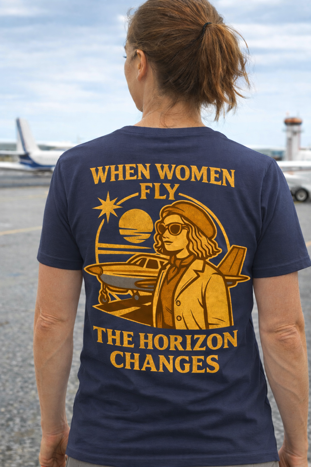 Women in Aviation Graphic T-Shirt – When Women Fly, the Horizon Changes